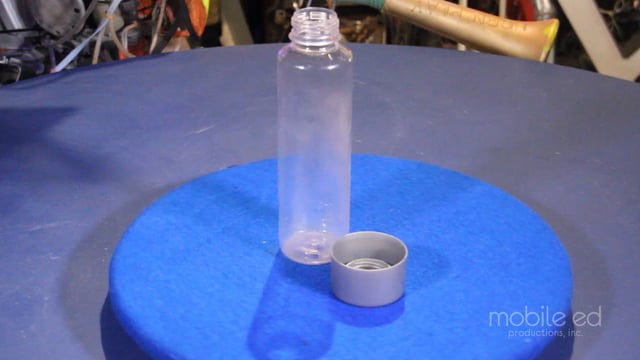 Use an empty plastic bottle.  This one is kind of unique and will make for an interesting looking display!
