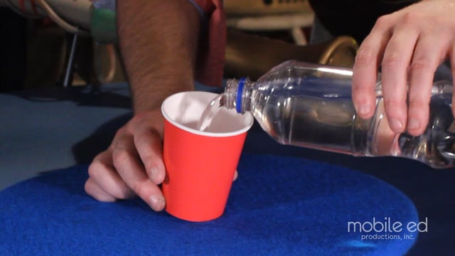 Fill one cup half-way with water